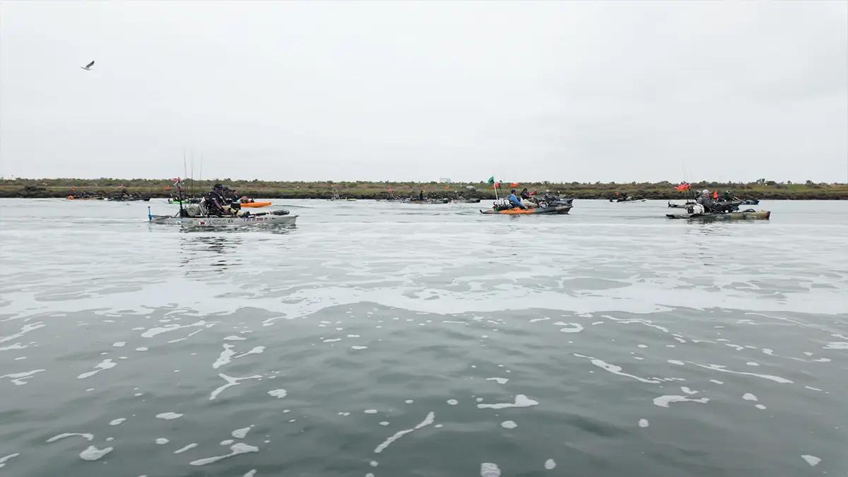 Kayak anglers fishing together on open water